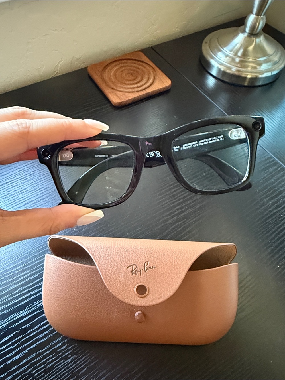 Black Ray-Ban Meta Glasses with transition lenses and case